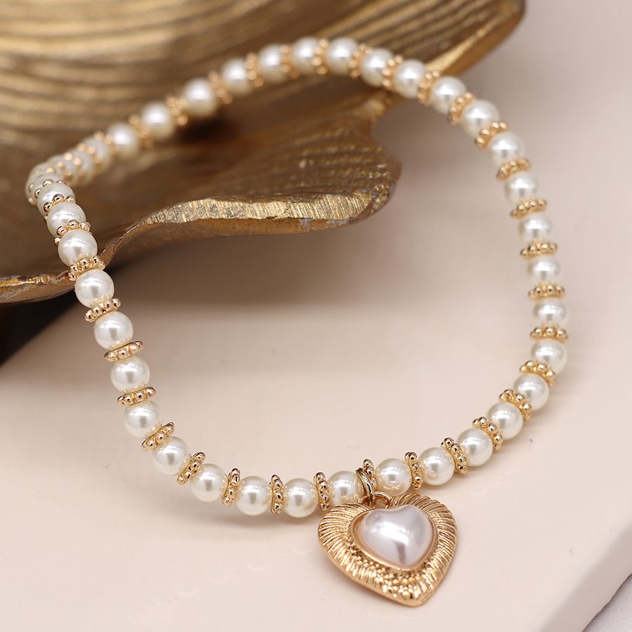Peace of Mind Ivory Faux Pearl and Golden Spacer Bracelet with Heart Charm