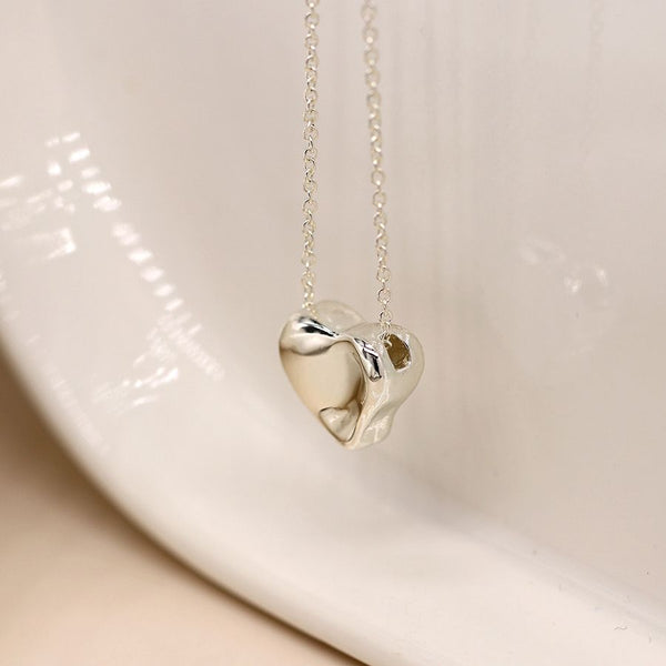 Peace of Mind Silver plated wavy surface heart necklace