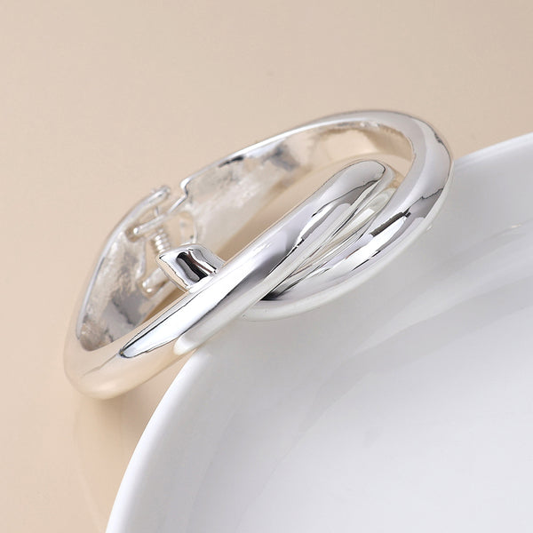 Peace of Mind Silver Plated Crossover Hinged Bangle