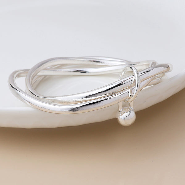 Peace of Mind Silver plated bangle stack with ball charm