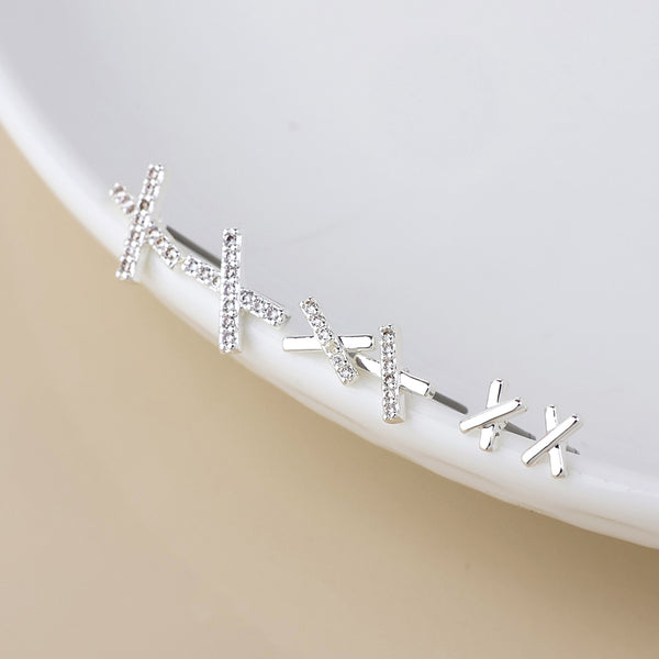 Peace of Mind Silver plated crystal detail triple x stud earrings