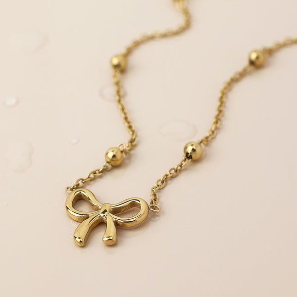Peace of Mind Waterproof Gold Plated Bead Chain and Bow Necklace