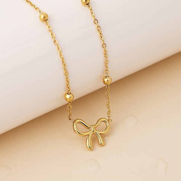 Peace of Mind Waterproof Gold Plated Bead Chain and Bow Necklace
