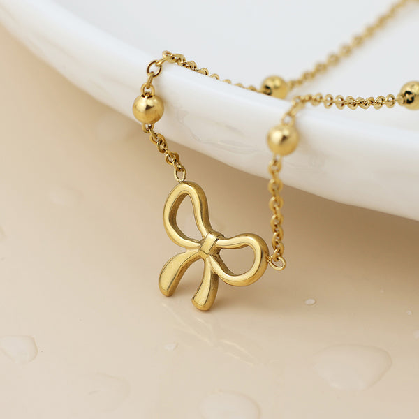 Peace of Mind Waterproof Gold Plated Bead Chain and Bow Necklace