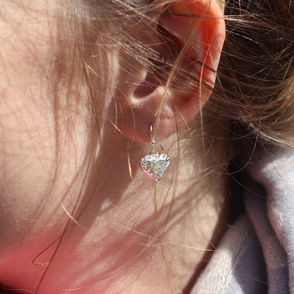 Peace of Mind Silver plated heart drop earrings with cosmic cut-outs