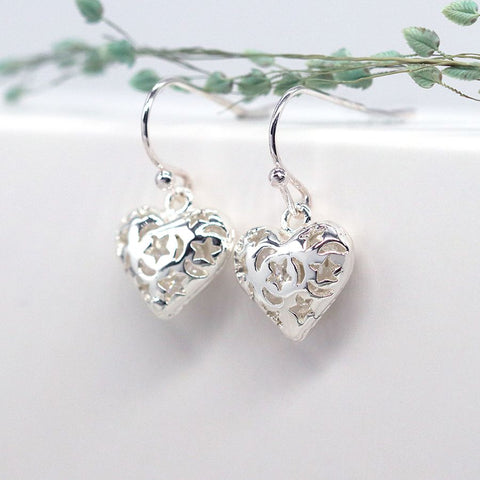 Peace of Mind Silver plated heart drop earrings with cosmic cut-outs