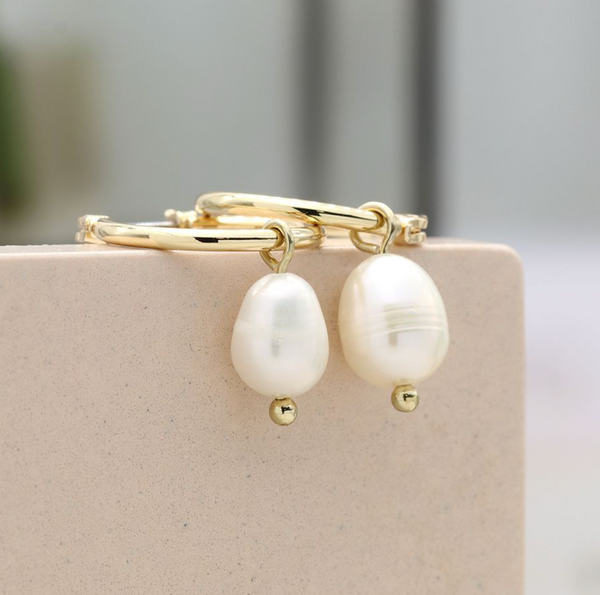 Peace of Mind Golden hoop earrings with ivory seed pearl drops